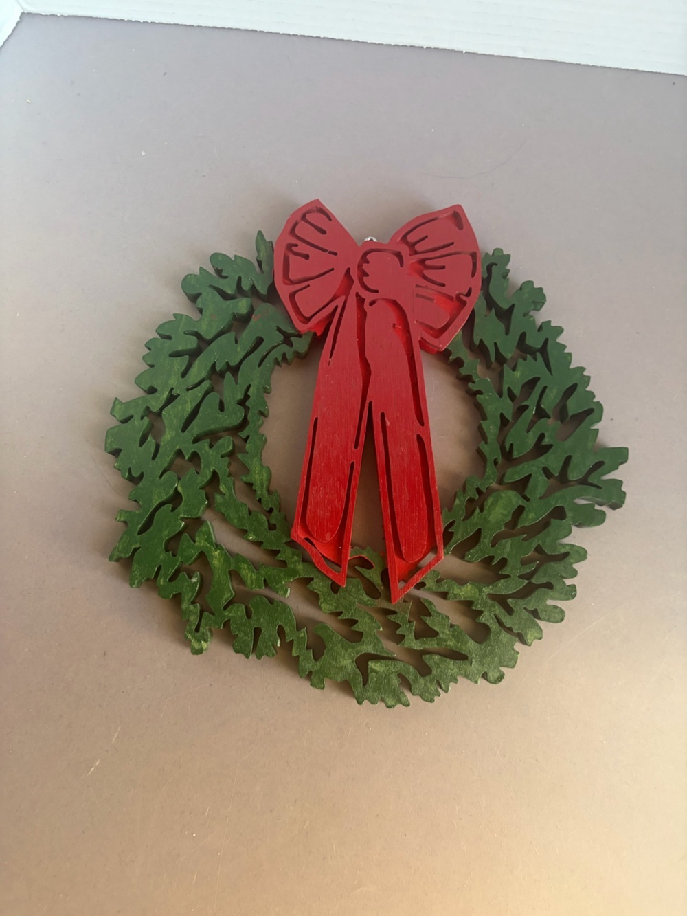 Handcrafted Wooden Holiday Wreath with Red Bow